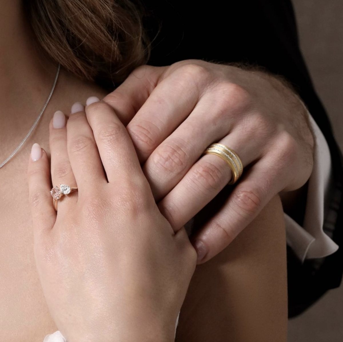A modern bridal pair: diamond solitaire engagement ring and 18ct gold wedding band, both sized to the wearer at the counter on Market Place last month.